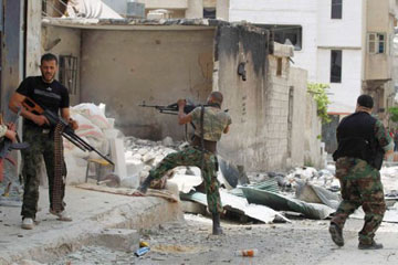 المرصد السوري: معارك عنيفة بين جيش الأسد ومقاتلي المعارضة بدمشق