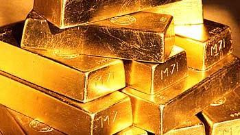 الذهب ينزل لأقل مستوى في شهر دون 1700 دولار للأوقية