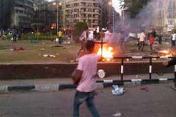 مجهولون يهاجمون معتصمي التحرير ويحرقون الخيام