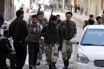 زعيم المعارضة يزور سوريا وسط هجوم للاسد