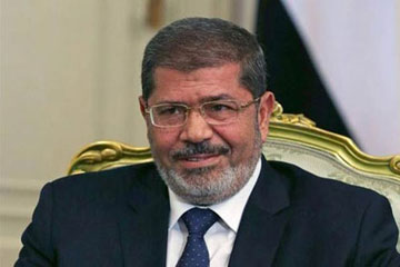 مرسي يهنئ المصريين الأقباط في أمريكا بعيد القيامة المجيد