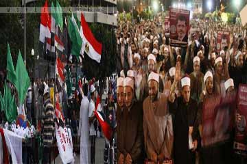 مؤيدو الرئيس المعزول يواصلون اعتصامهم بميدانى رابعة العدوية والنهضة