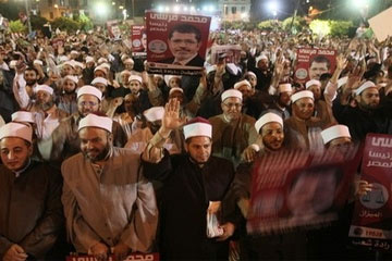 مؤيدو مرسى يواصلون اعتصامهم برابعة والنهضة لليوم الـ19