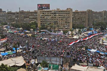 “الدفاع الوطني” يدعو معتصمي رابعة والنهضة لنبذ العنف