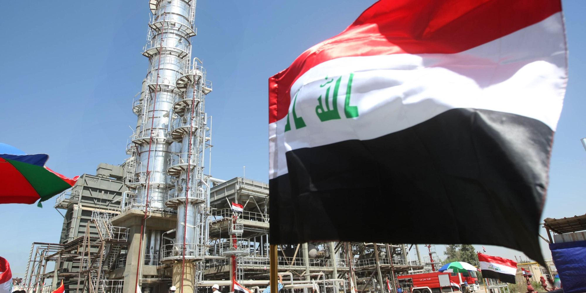 The Iraqi flag flutters during the official opening of the second refinery for crude oil in Al-Dora refinery complex in Baghdad on September 16, 2010. The refinery will produce 70,000 barrels per day of white oil, gas, diesel and liquid gas. AFP PHOTO/ AHMAD AL-RUBAYE (Photo credit should read AHMAD AL-RUBAYE/AFP/Getty Images)