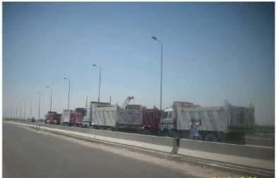 «النقل» تعلن نجاح تجربة التحميل على كوبرى طما