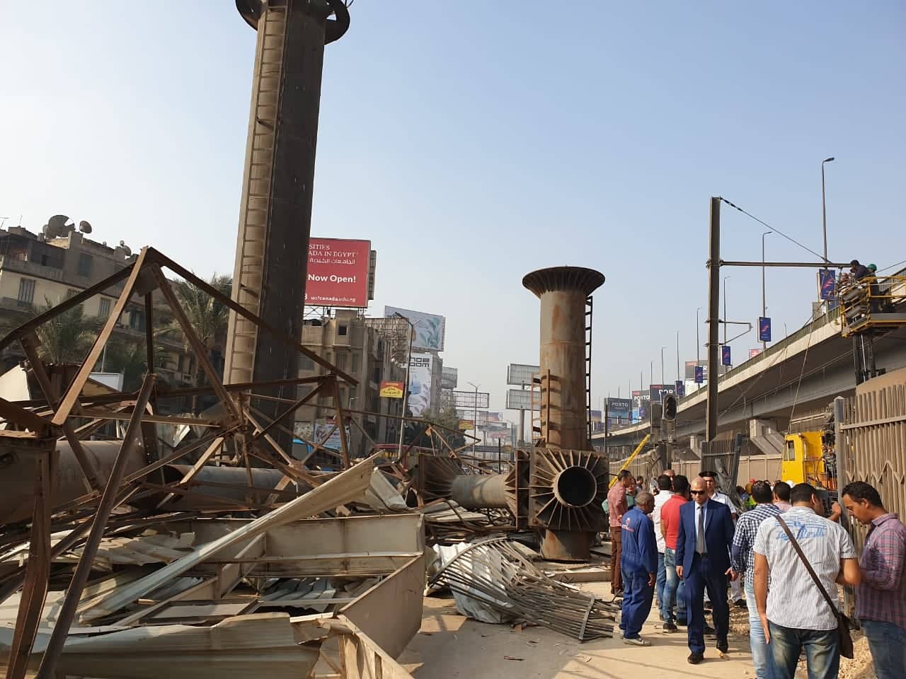 “النقل” تدفع بأتوبيسات لحين إصلاح عطل الشبكة الهوائية في الخط الأول للمترو