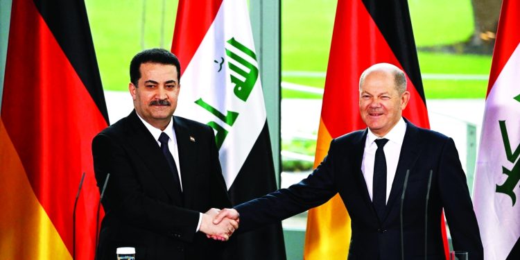 رئيس الوزراء العراقي محمد شياع السوداني والمستشار الألماني شولتس